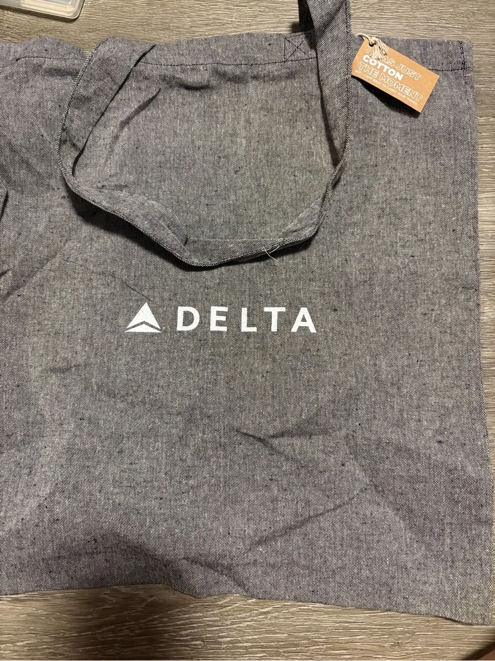 Delta Airlines Grey Canvas Tote with White Slogan - 'Welcoming Elevated Caring'